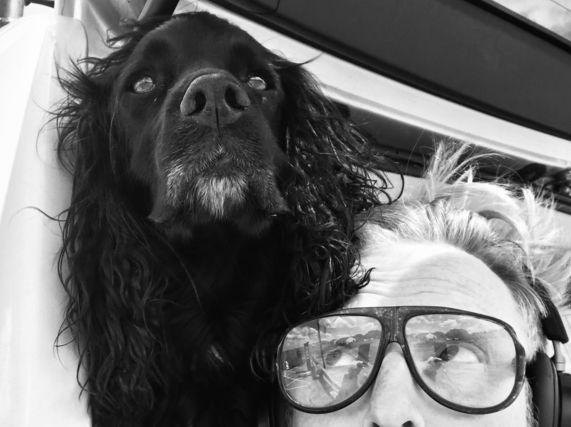 Image shows Ryan Board with his dog Wolfgang in an outdoor location in Kent